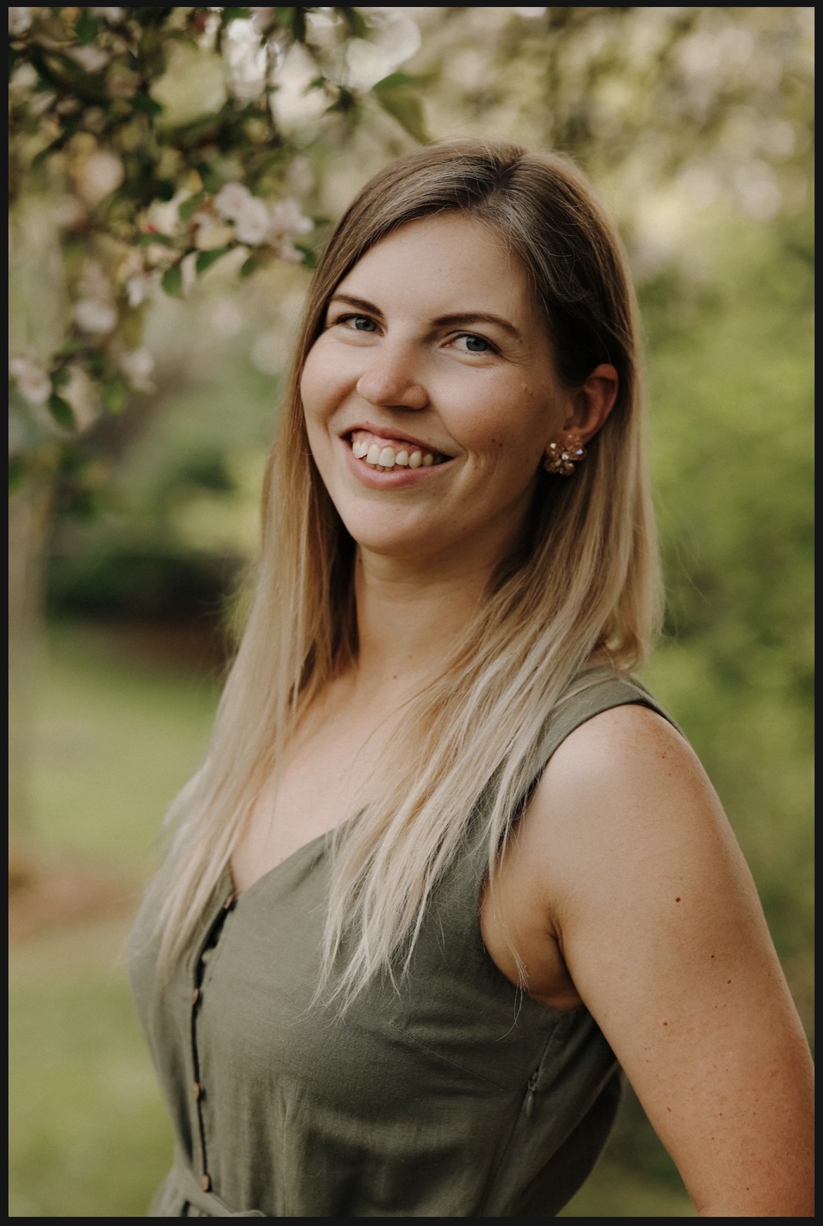 Portrait of Liina Laul smiling outdoors